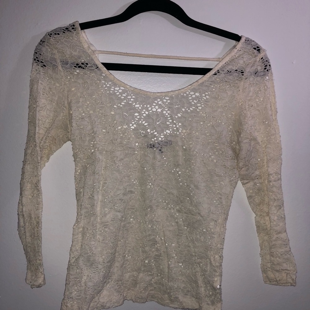 Sheer cream top.